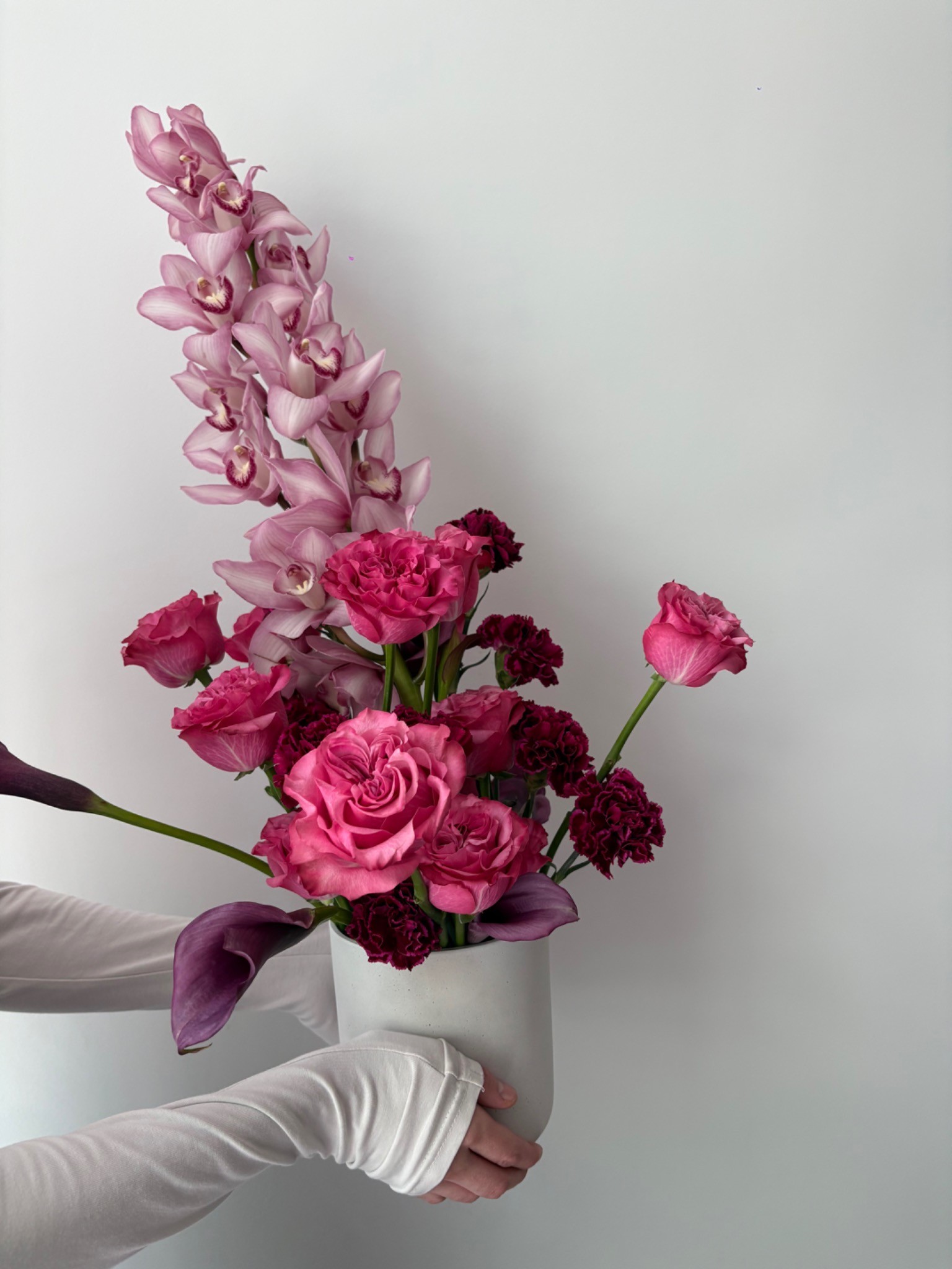 Pink orchid and calla lily editorial floral arrangement by Wilted NYC